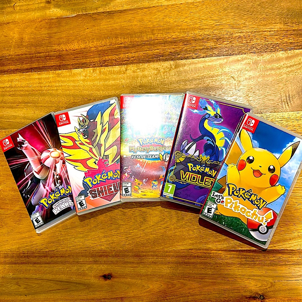 5 authentic Nintendo Pokémon games. Like-brand new condition.